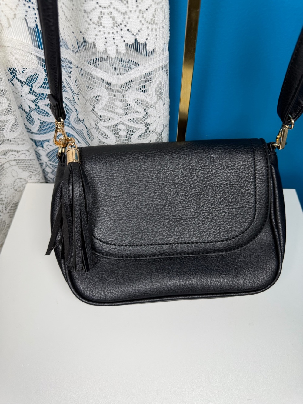Amazon Black Pebbled Leather Crossbody with Tassel Accent 6 in H x 8 in L